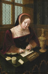 A_lady_writing_at_a_desk